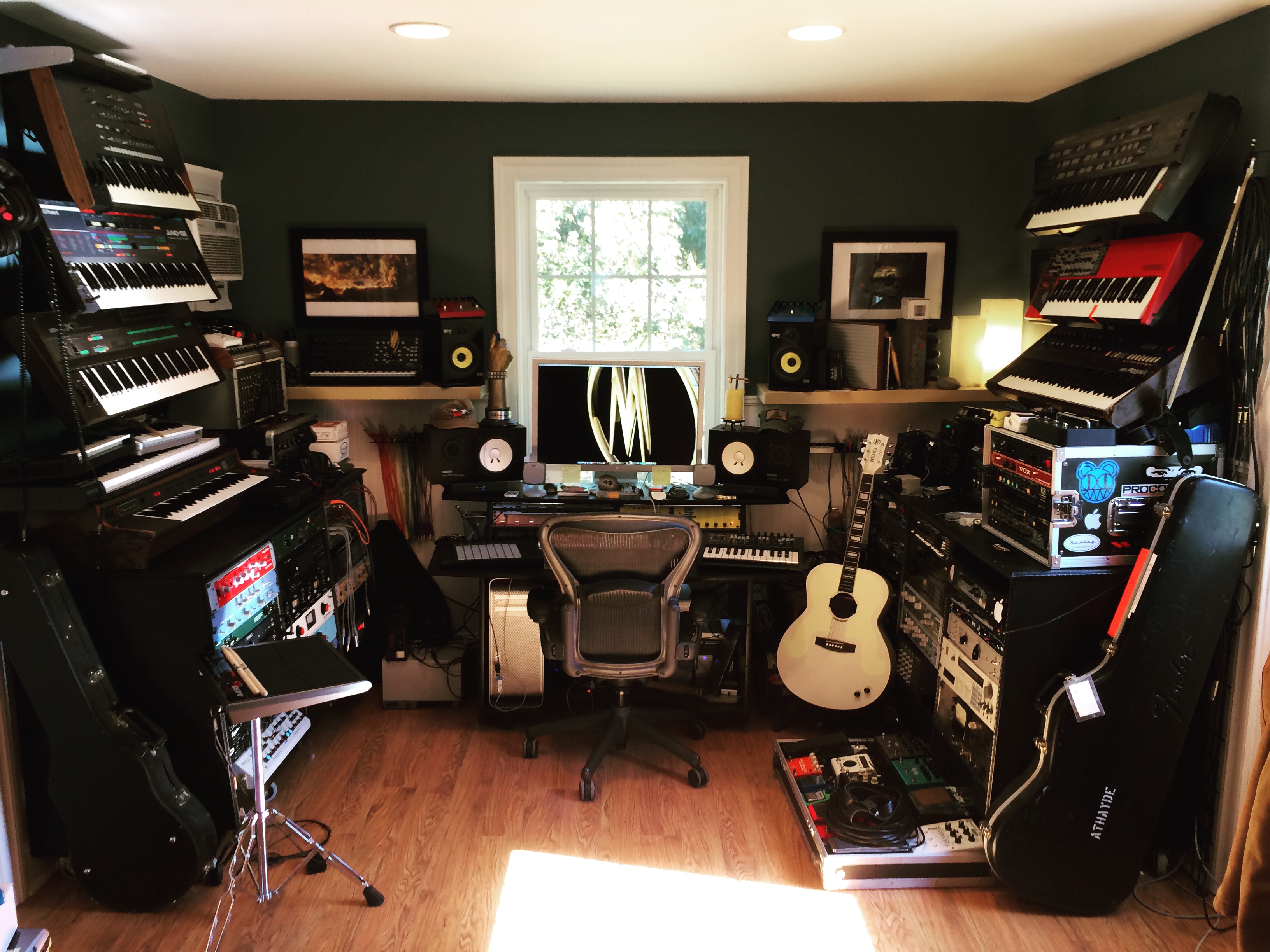 The studio: keyboards, outboard racks, and the desk